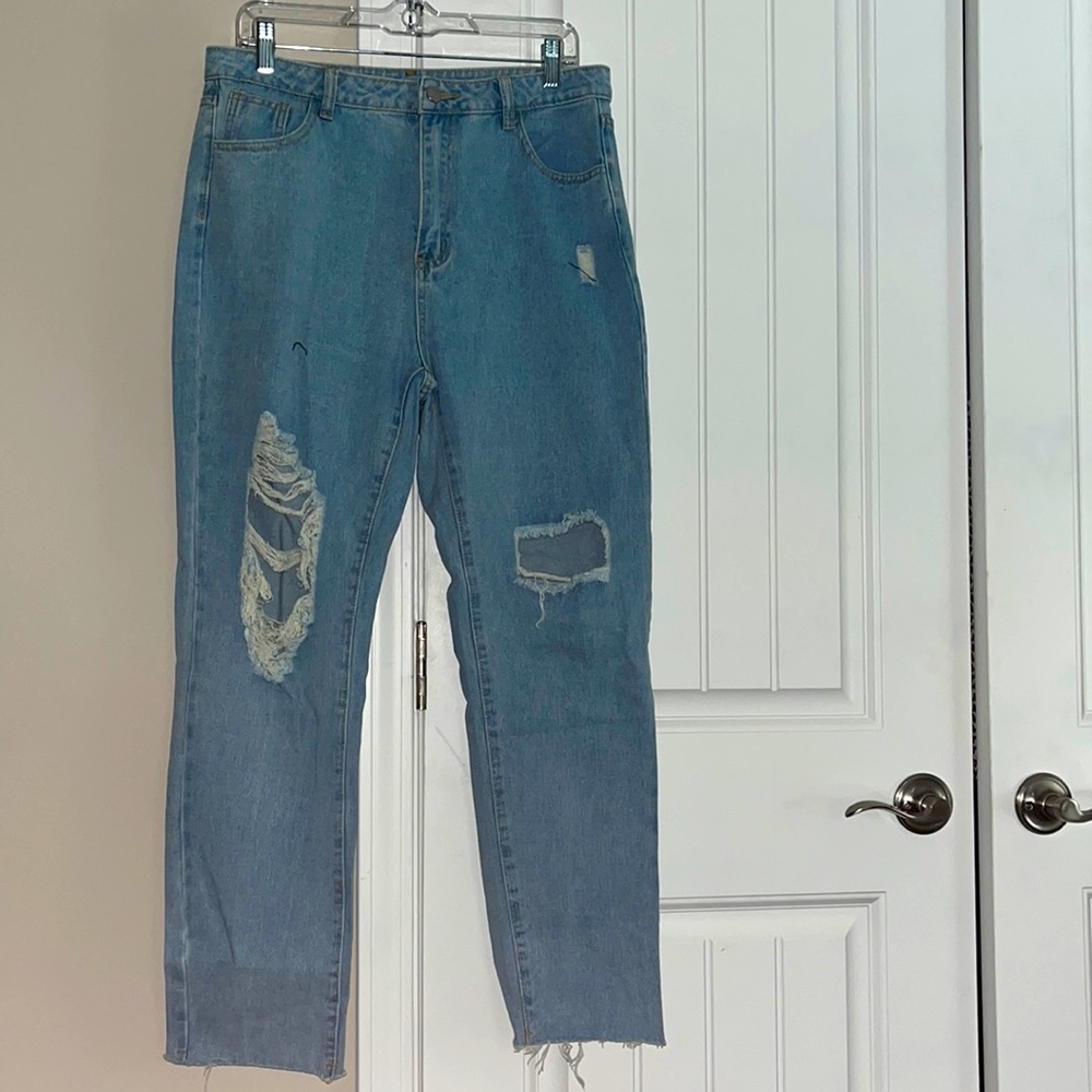 Women’s ripped blue jeans